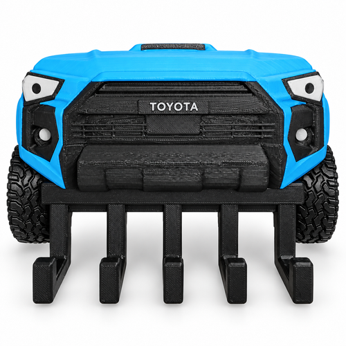 Blue 5th Gen Toyota 4Runner style wall key hanger with five black hooks, off-road tires and black grille on a clean studio background
